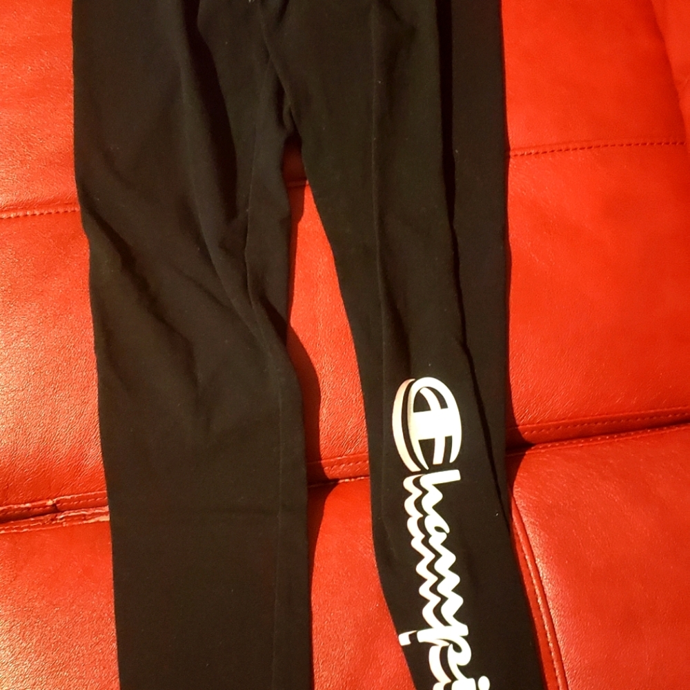 Girls Black pants with Champion written on leg